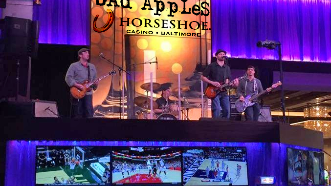 Bad Apples band members rocking on Horse Shoe Casino stage